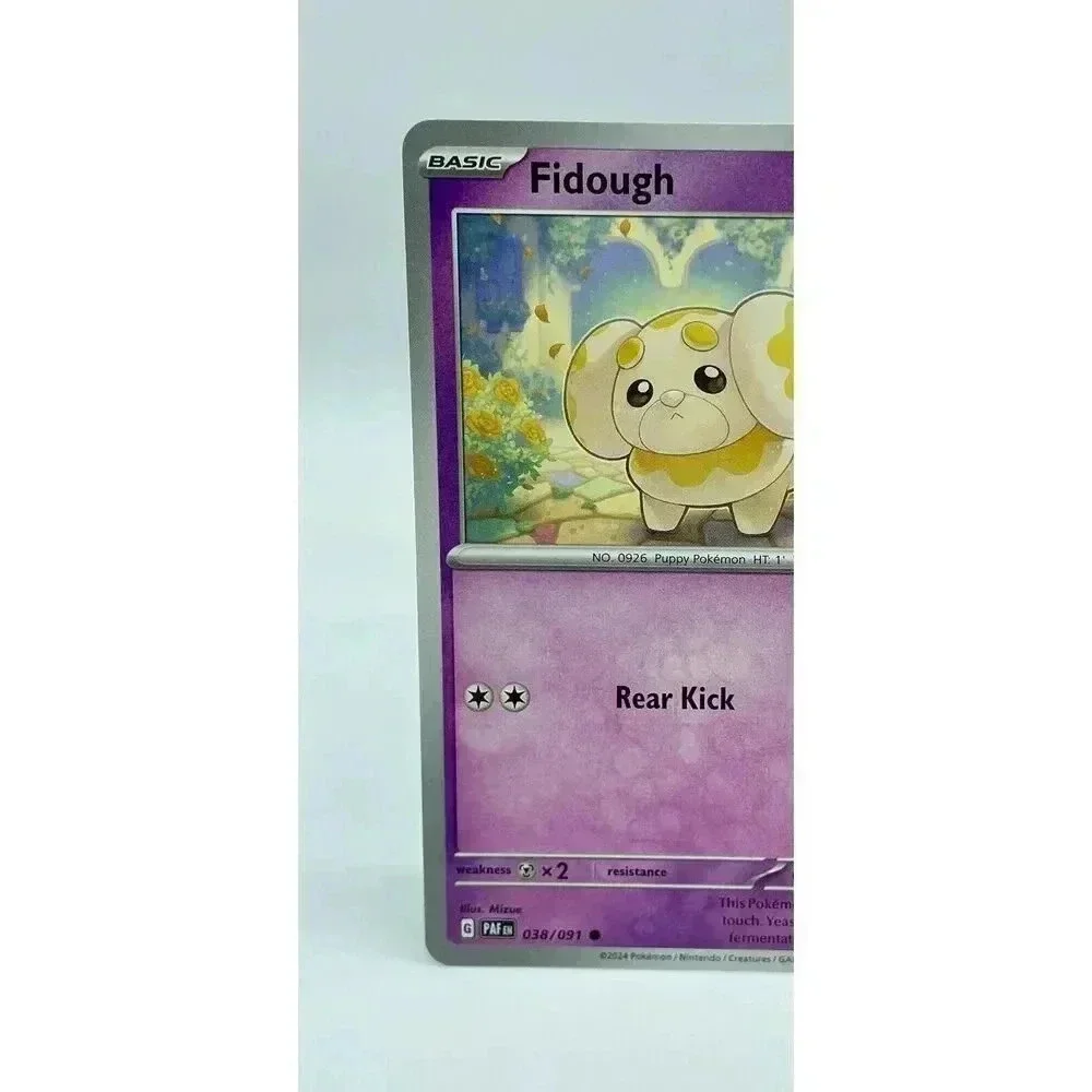 Fidough‎ 038/091 S & V: Paldean Fates Common Non-Holo Pokemon TCG Mint Unplayed